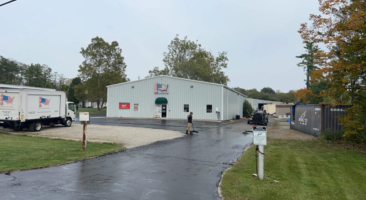 Commercial property being sealcoated by the Myers crew