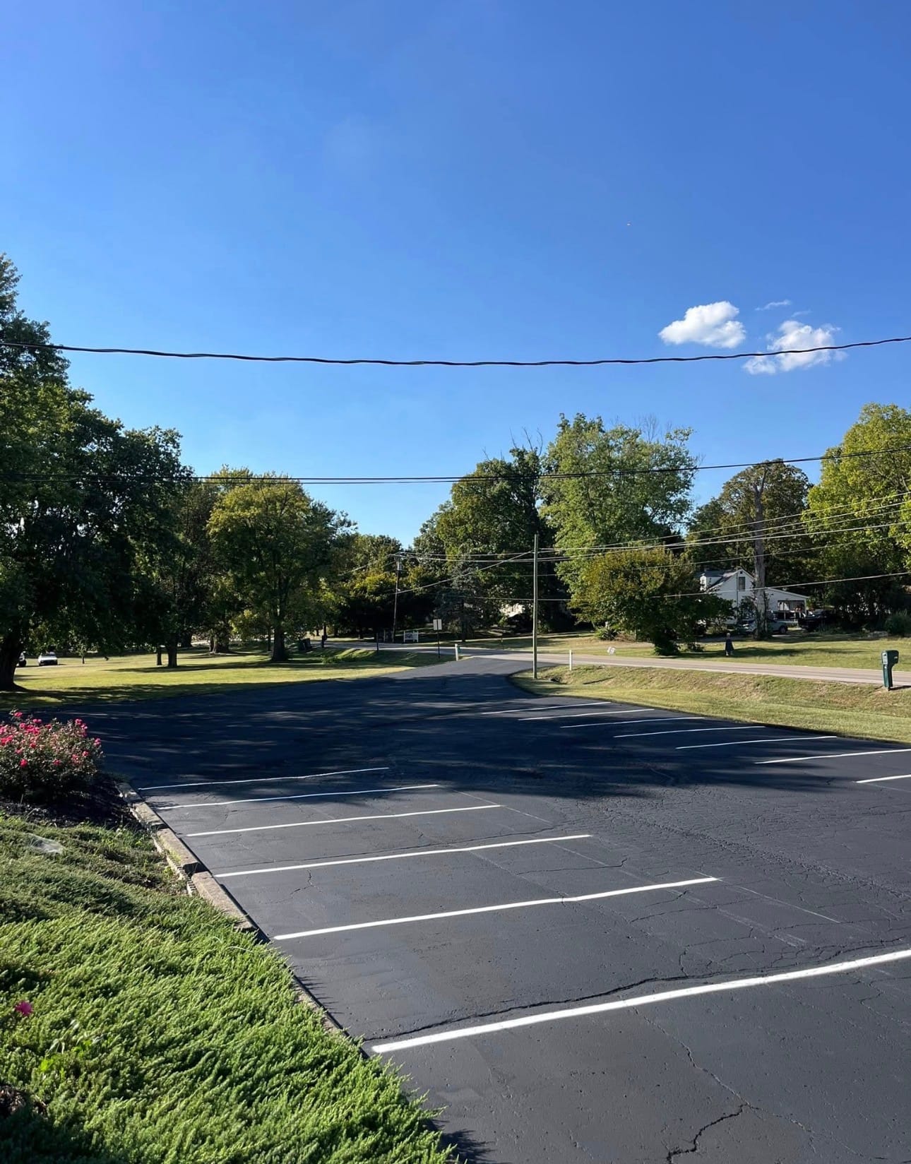 Freshly painted parking-lot line striping by Myers Sealcoating